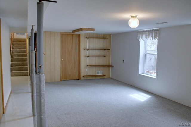 2683 Elmwood Dr, Adrian, MI 49221 - unfurnished room with carpet floors and stairs