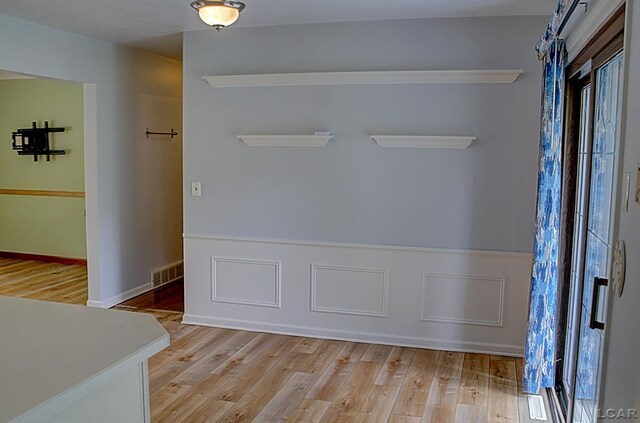 2683 Elmwood Dr, Adrian, MI 49221 - unfurnished room featuring light wood finished floors