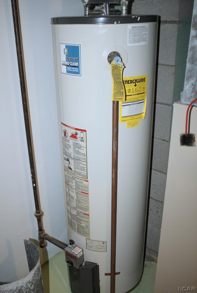 2683 Elmwood Dr, Adrian, MI 49221 - utility room featuring water heater