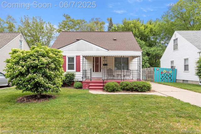 919 Whitcomb Ave, Royal Oak, MI 48073 - bungalow-style house featuring a porch, roof with shingles, and board and batten siding