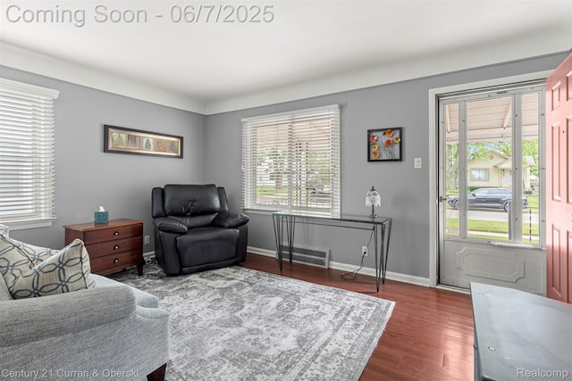 919 Whitcomb Ave, Royal Oak, MI 48073 - living area featuring dark wood-type flooring, healthy amount of natural light, and baseboards