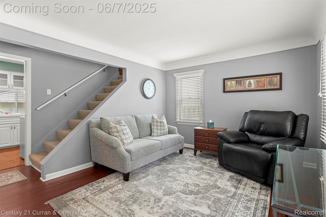 919 Whitcomb Ave, Royal Oak, MI 48073 - living room featuring stairway, wood finished floors, and baseboards
