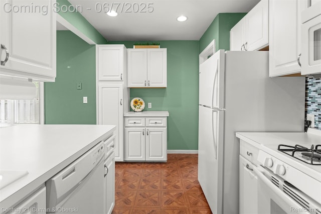 919 Whitcomb Ave, Royal Oak, MI 48073 - kitchen featuring white appliances, white cabinets, light countertops, and recessed lighting