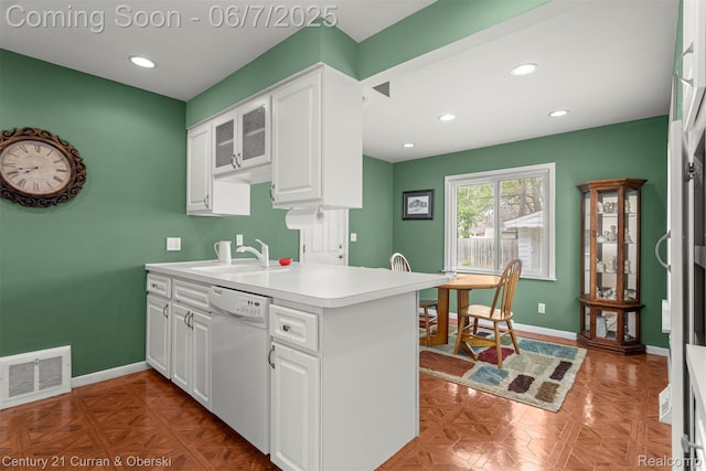 919 Whitcomb Ave, Royal Oak, MI 48073 - kitchen featuring dishwasher, a sink, white cabinetry, baseboards, and recessed lighting