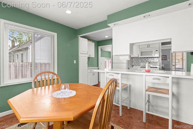 919 Whitcomb Ave, Royal Oak, MI 48073 - dining space with recessed lighting and baseboards