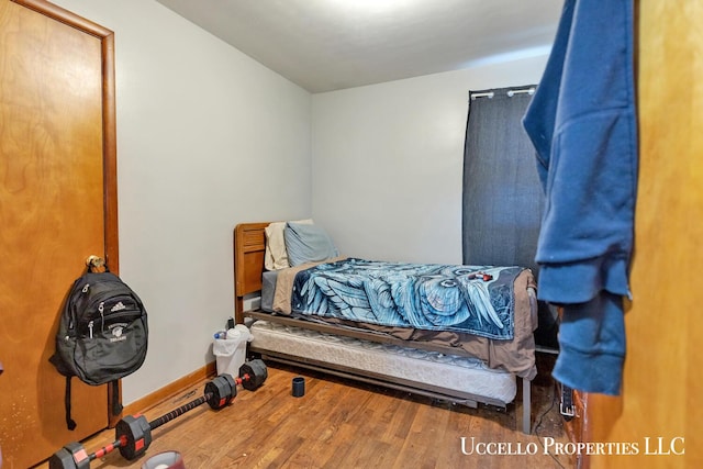 4505 E Apple Ave, Muskegon, MI 49442 - bedroom featuring wood finished floors and baseboards