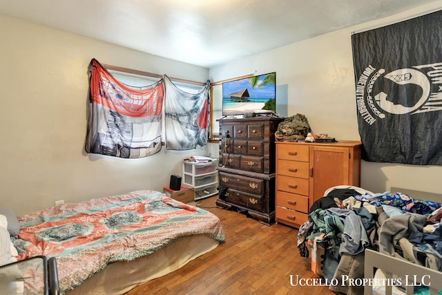 4505 E Apple Ave, Muskegon, MI 49442 - bedroom featuring hardwood / wood-style flooring