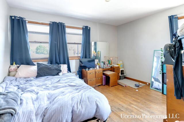 4505 E Apple Ave, Muskegon, MI 49442 - bedroom featuring light wood-style floors and baseboards