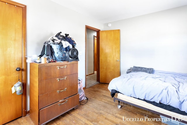4505 E Apple Ave, Muskegon, MI 49442 - bedroom featuring light wood-style floors