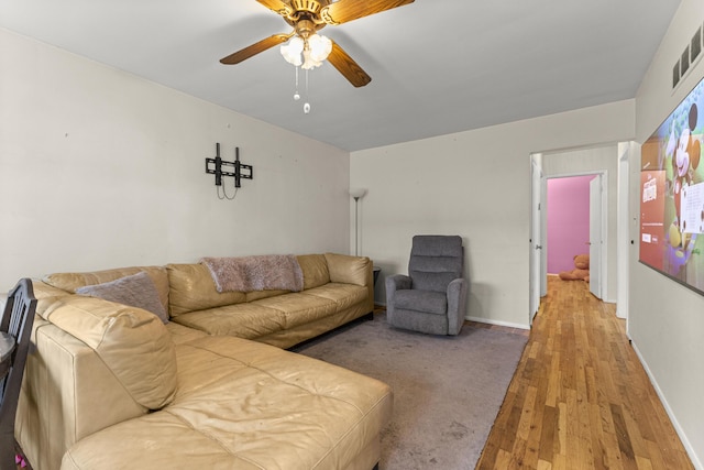 15944 Meyer Ave, Allen Park, MI 48101 - living area featuring ceiling fan, wood finished floors, and baseboards