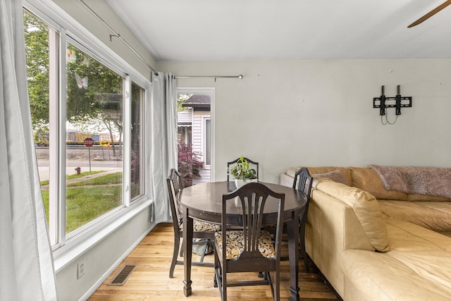 15944 Meyer Ave, Allen Park, MI 48101 - dining area with a ceiling fan, light wood-type flooring, and baseboards
