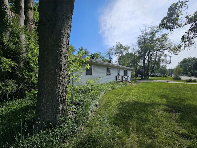 607 66th St SE, Grand Rapids, MI 49548 - view of green lawn