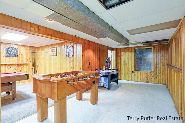 607 66th St SE, Grand Rapids, MI 49548 - rec room featuring wood walls, light floors, and pool table