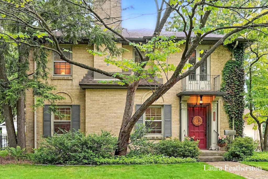 959 Pinecrest Ave SE, Grand Rapids, MI 49506 - view of front of home featuring brick siding and a balcony