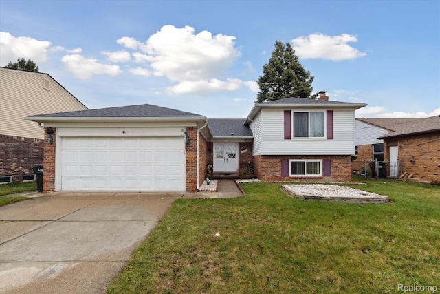 13439 Brougham Dr, Warren, MI 48312 - tri-level home with concrete driveway, an attached garage, a front yard, and brick siding