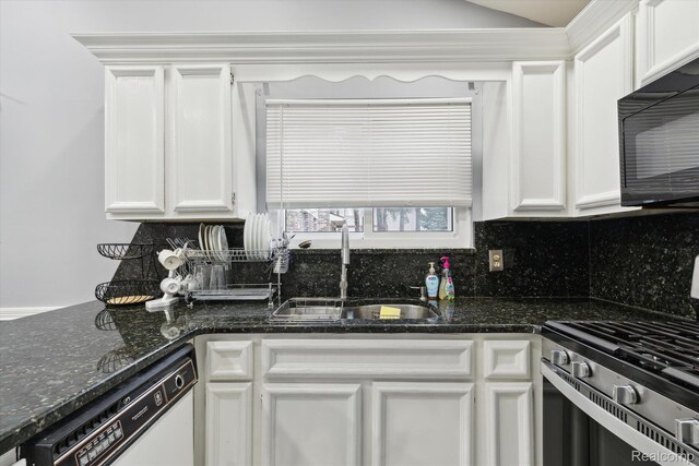 13439 Brougham Dr, Warren, MI 48312 - kitchen with stainless steel range with gas stovetop, white dishwasher, black microwave, a sink, and white cabinets