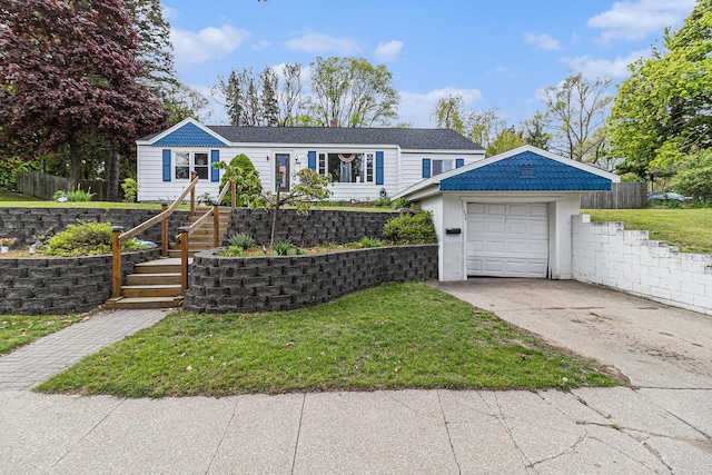 299 5th Ave, Manistee, MI 49660 - view of front of property featuring driveway and stairs