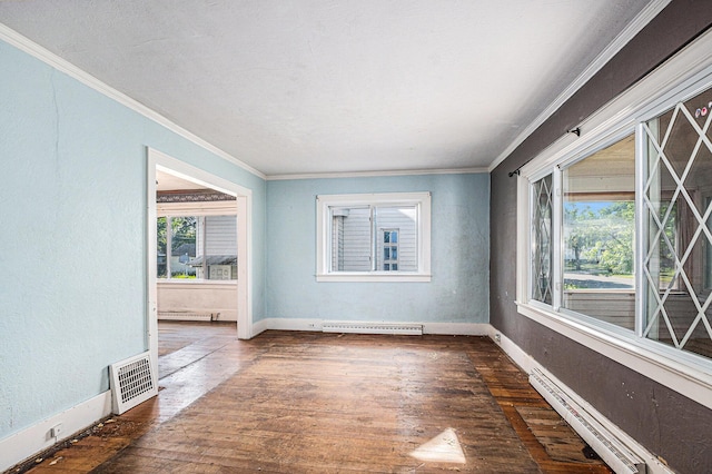 337 W 18th St, Holland, MI 49423 - unfurnished room with crown molding, wood-type flooring, a baseboard radiator, and baseboards