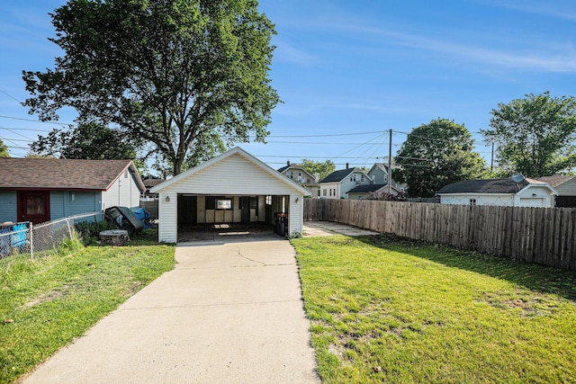 337 W 18th St, Holland, MI 49423 - view of yard featuring a garage