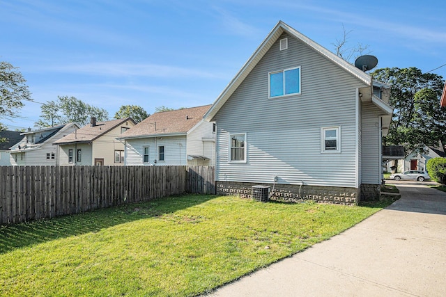 337 W 18th St, Holland, MI 49423 - rear view of property featuring central AC unit