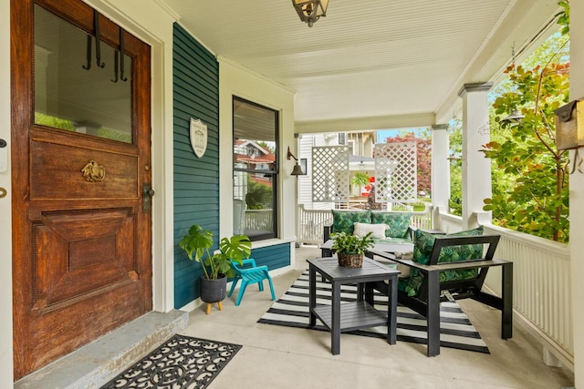 573 College Ave SE, Grand Rapids, MI 49503 - porch with an outdoor living space