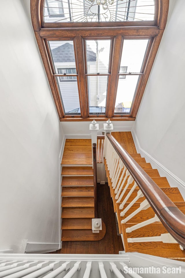573 College Ave SE, Grand Rapids, MI 49503 - stairs featuring wood finished floors