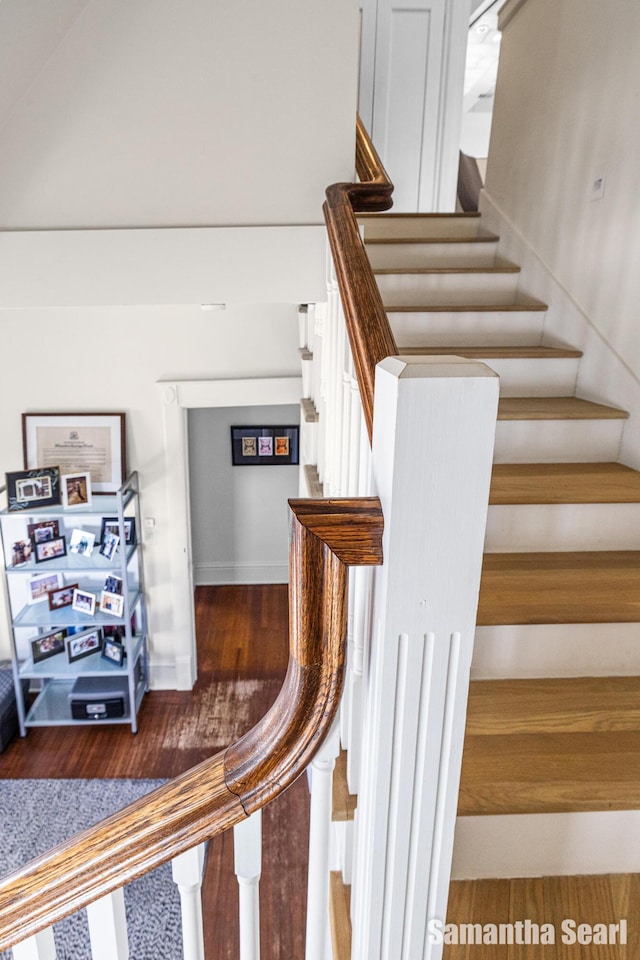 573 College Ave SE, Grand Rapids, MI 49503 - stairway featuring wood finished floors