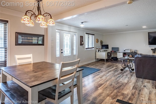 4879 Sundale Dr, Clarkston, MI 48346 - dining area featuring wood finished floors, crown molding, a chandelier, a desk, and baseboards