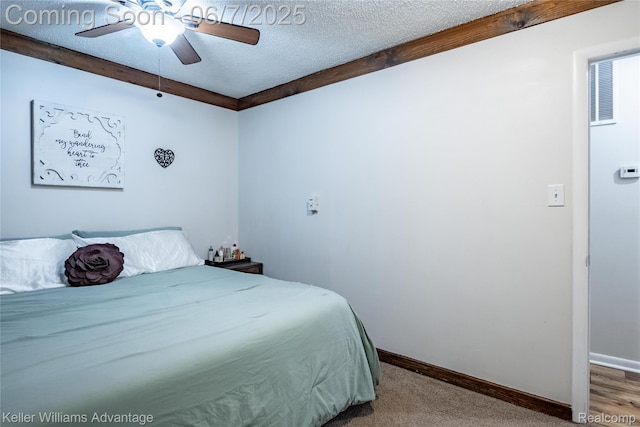 4879 Sundale Dr, Clarkston, MI 48346 - carpeted bedroom featuring a textured ceiling, baseboards, and ceiling fan