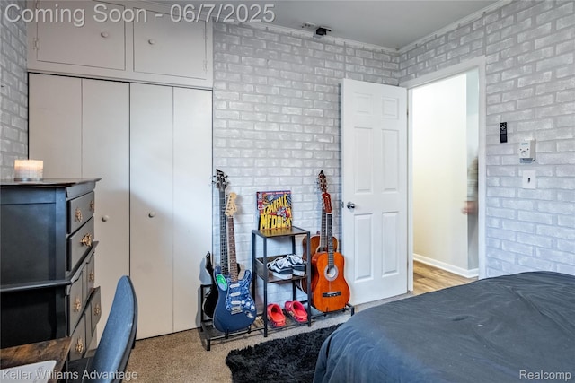 4879 Sundale Dr, Clarkston, MI 48346 - bedroom with brick wall and a closet