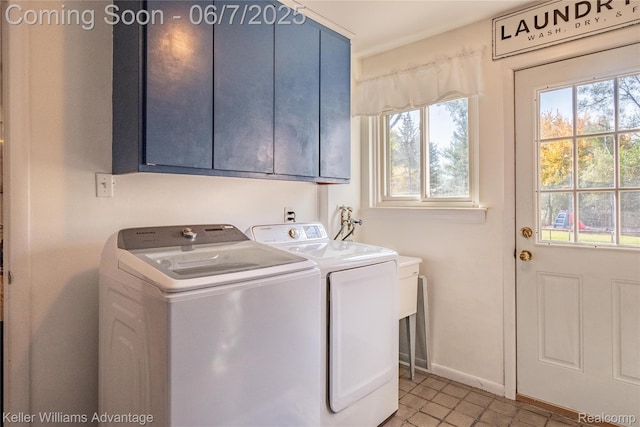 4879 Sundale Dr, Clarkston, MI 48346 - laundry room with cabinet space, washing machine and clothes dryer, and baseboards