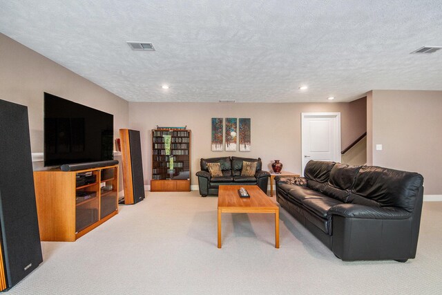 883 Water Ridge Dr, Byron Center, MI 49315 - living room with carpet floors, recessed lighting, a textured ceiling, baseboards, and stairs