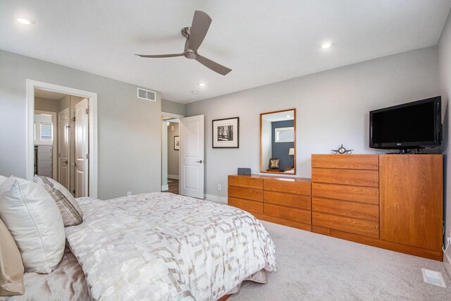 883 Water Ridge Dr, Byron Center, MI 49315 - carpeted bedroom featuring recessed lighting, ceiling fan, ensuite bath, and baseboards