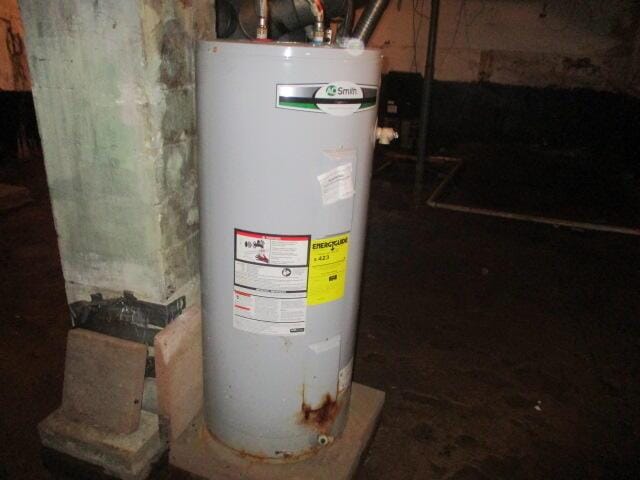 322 Crescent St, Watervliet, MI 49098 - utility room featuring water heater