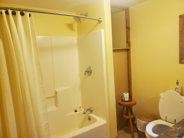 3354 E Arthur, Rothbury, MI 49452 - bathroom featuring toilet, shower / tub combo with curtain, and tile patterned floors