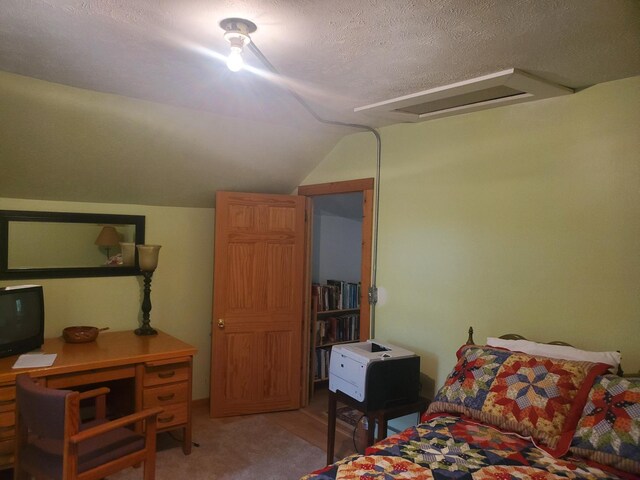 3354 E Arthur, Rothbury, MI 49452 - bedroom featuring vaulted ceiling, a textured ceiling, and light colored carpet