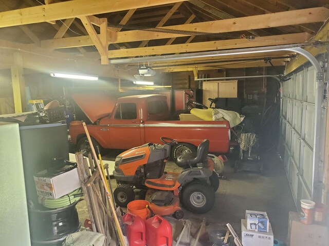 3354 E Arthur, Rothbury, MI 49452 - garage with a garage door opener