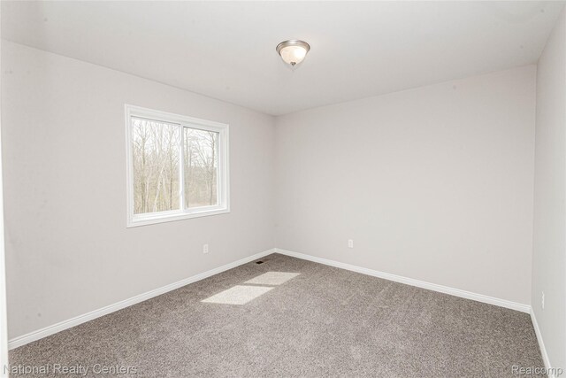 20 Medford Hill Dr, Metamora, MI 48455 - unfurnished room featuring carpet flooring and baseboards