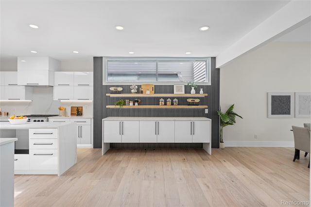 1752 Alexander Dr, Bloomfield, MI 48302 - bar featuring light wood finished floors, recessed lighting, wall chimney exhaust hood, and baseboards