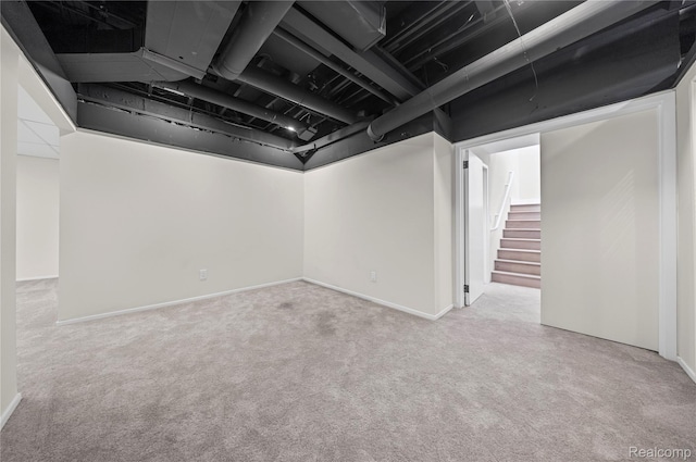 1752 Alexander Dr, Bloomfield, MI 48302 - finished basement featuring carpet flooring, stairway, and baseboards
