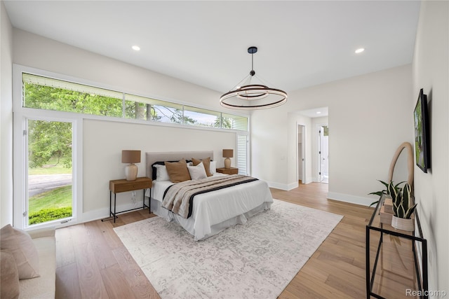 1752 Alexander Dr, Bloomfield, MI 48302 - bedroom featuring baseboards, light wood finished floors, recessed lighting, and a chandelier
