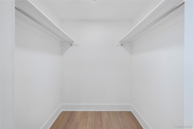 1752 Alexander Dr, Bloomfield, MI 48302 - walk in closet with wood finished floors
