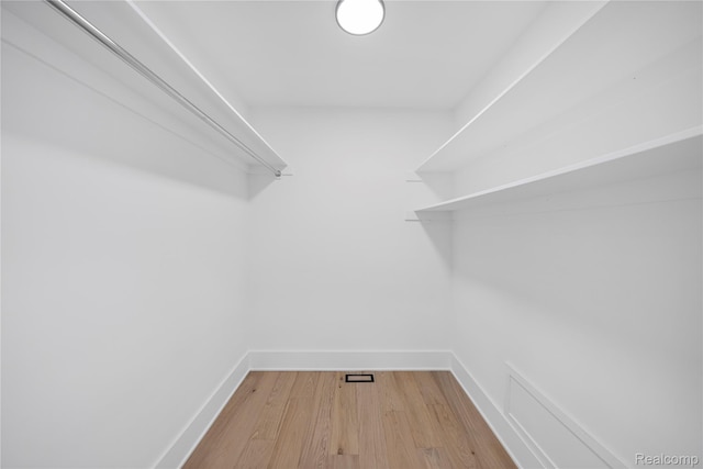 1752 Alexander Dr, Bloomfield, MI 48302 - walk in closet with wood finished floors