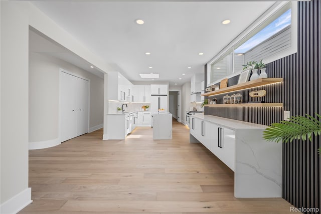 1752 Alexander Dr, Bloomfield, MI 48302 - kitchen featuring white cabinetry, open shelves, baseboards, light wood-type flooring, and recessed lighting