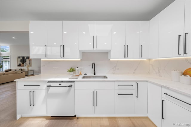 1752 Alexander Dr, Bloomfield, MI 48302 - kitchen with a sink, dishwasher, modern cabinets, white cabinets, and light wood-style floors