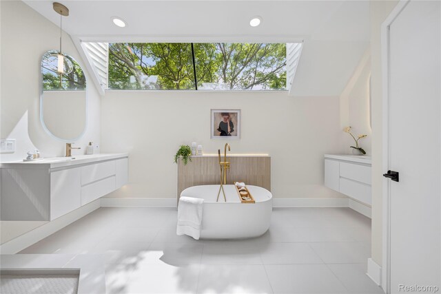 1752 Alexander Dr, Bloomfield, MI 48302 - bathroom featuring vanity, a freestanding bath, baseboards, tile patterned floors, and recessed lighting