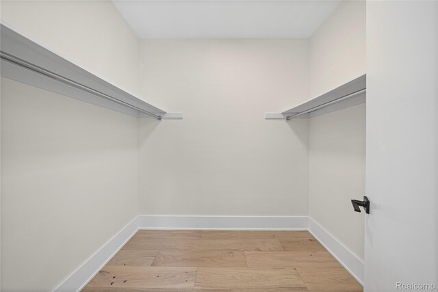 1752 Alexander Dr, Bloomfield, MI 48302 - spacious closet featuring light wood finished floors