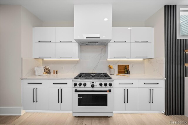 1752 Alexander Dr, Bloomfield, MI 48302 - kitchen featuring white range with gas cooktop, modern cabinets, extractor fan, and white cabinetry