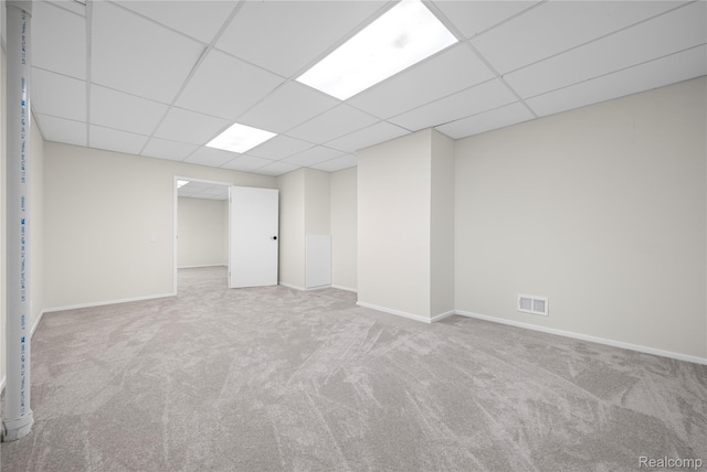 1752 Alexander Dr, Bloomfield, MI 48302 - basement featuring a drop ceiling, carpet, baseboards, and a heating unit