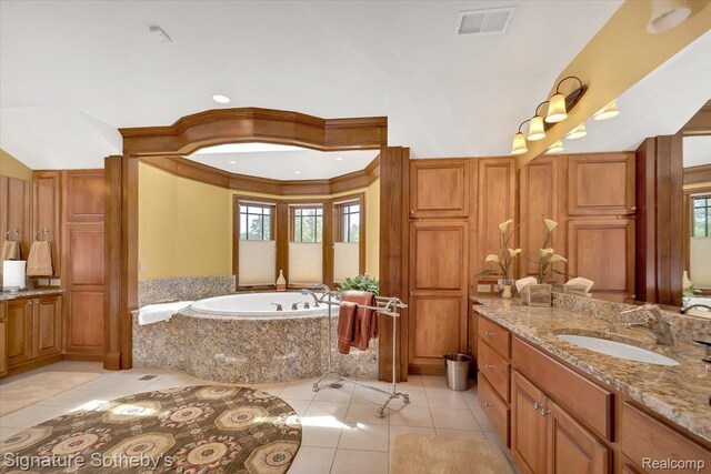 4150 Port Austin Rd, Caseville, MI 48725 - full bathroom with tile patterned floors, a bath, and vanity